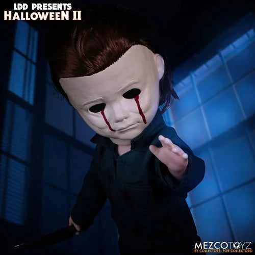 This is a Halloween II Michael Myers Living Dead Doll that is standing in a hospital and he has blood tears